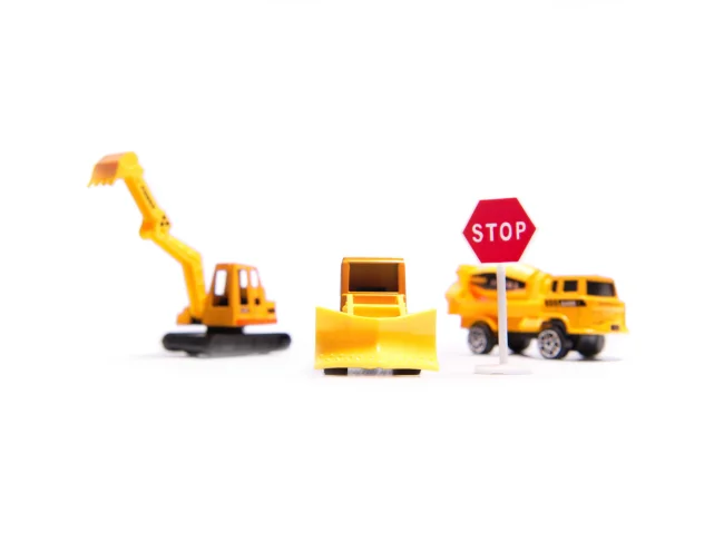 Samolot transporter z autami maszyny budowlane bok